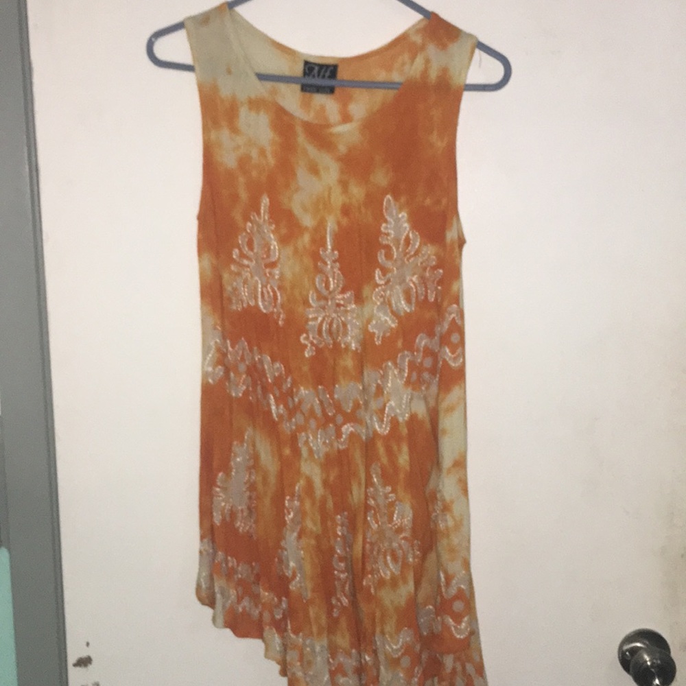 Orange free flowing dress with lace